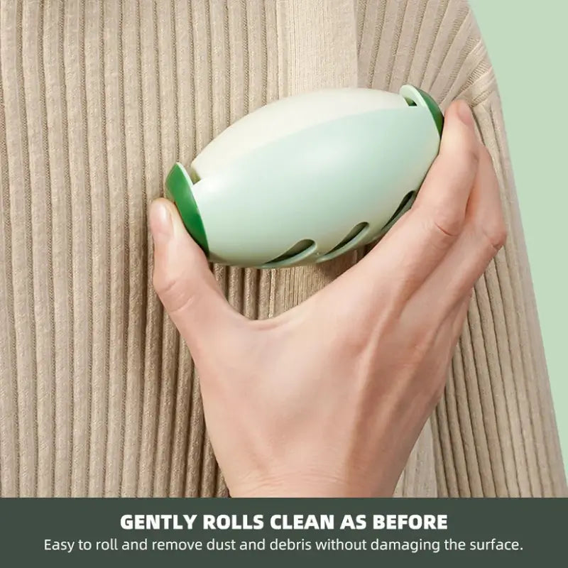 Hand holding a green cleaning tool against a textured beige surface with text indicating its use.
